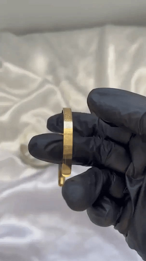 JHATPAT gold-tone Islamic Ayat ul Kursi bangle with Arabic calligraphy engraving. Elegant, spiritual jewelry.