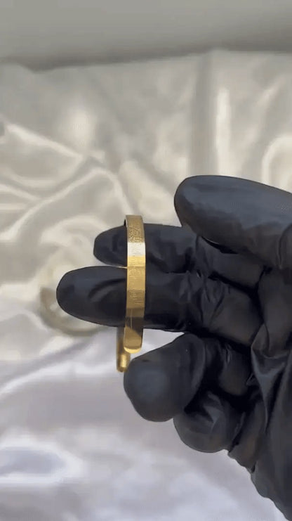 JHATPAT gold-tone Islamic Ayat ul Kursi bangle with Arabic calligraphy engraving. Elegant, spiritual jewelry.