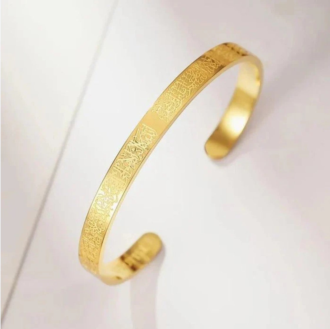 JHATPAT gold-tone Islamic Ayat ul Kursi scripted bangle with Arabic calligraphy engraving.